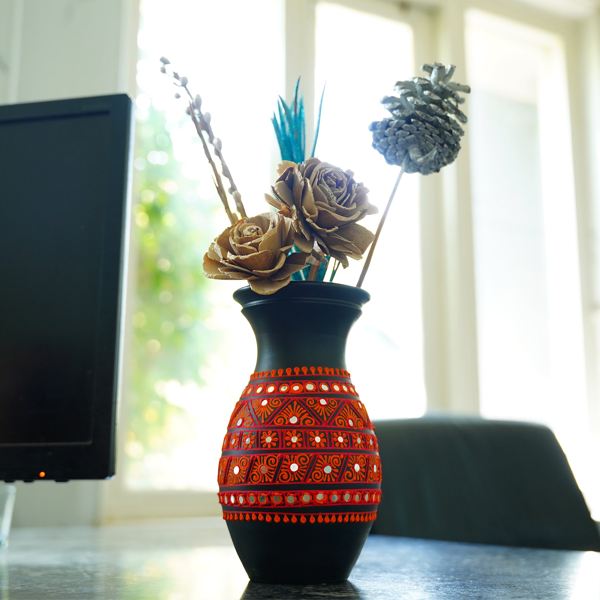 Handcrafted Black Terracotta Vase with Vibrant Red Tribal Design