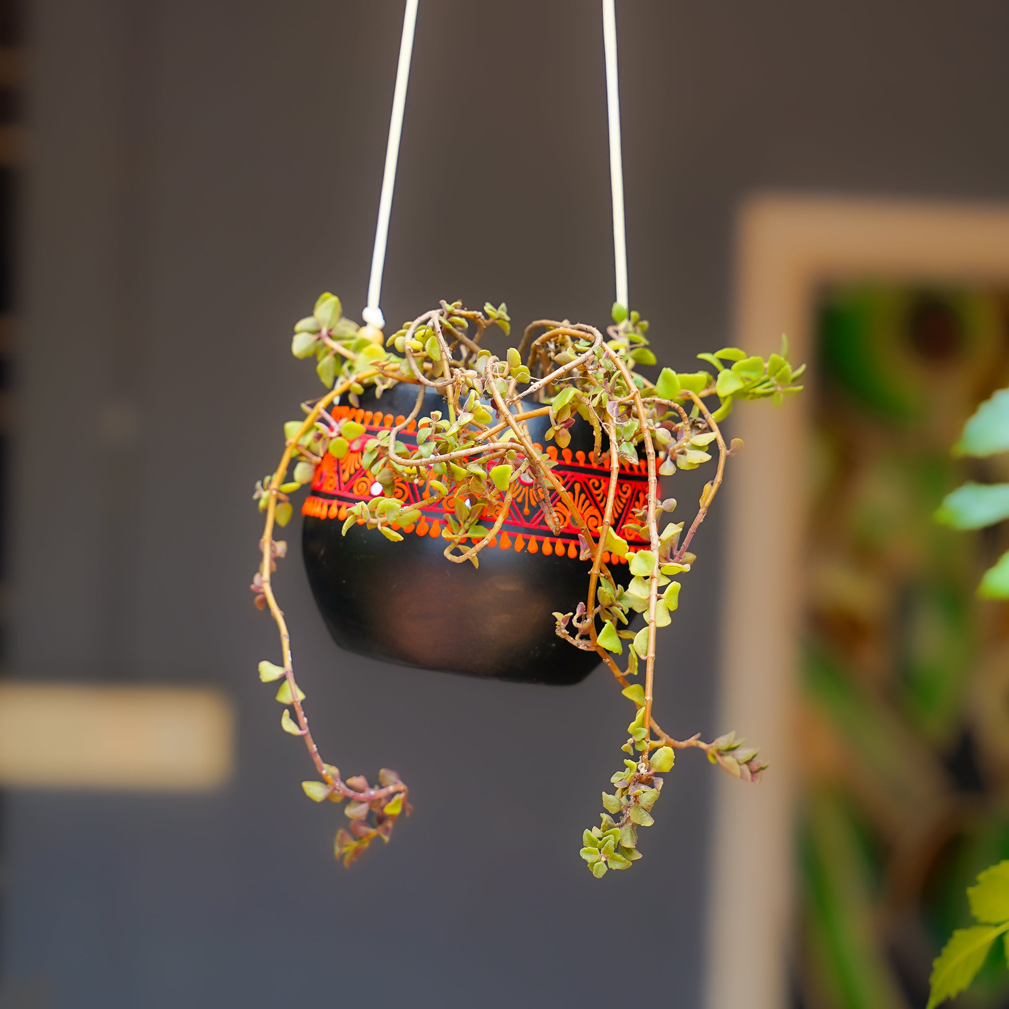 Black Earthenware Hanging Pot with Orange Tribal Art