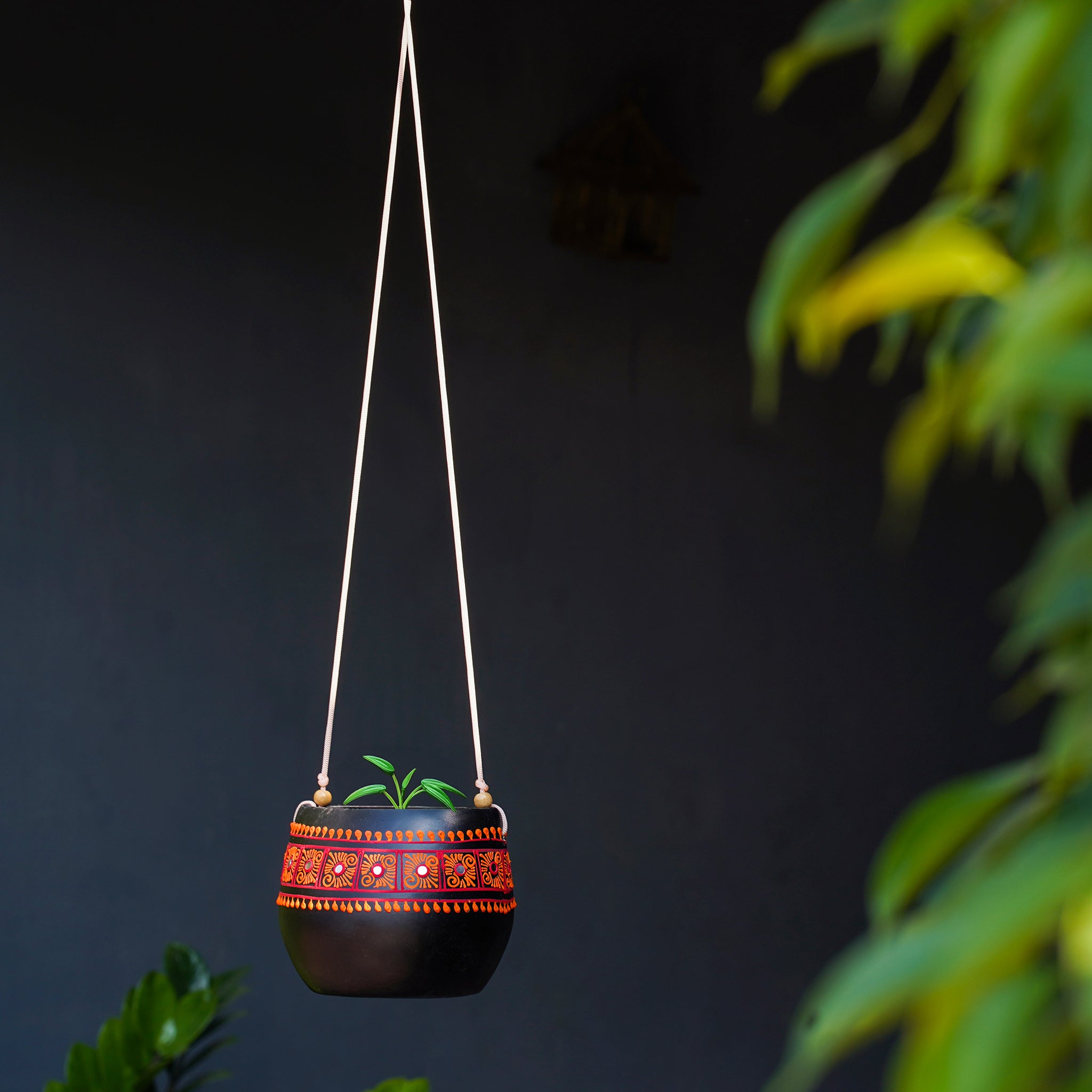 Black Earthenware Hanging Pot with Orange Tribal Art
