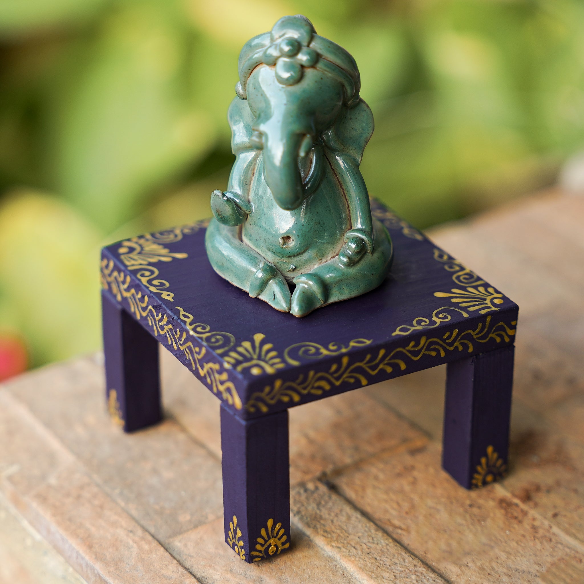 Decorative Ceramic Ganesha with Painted Wooden Base