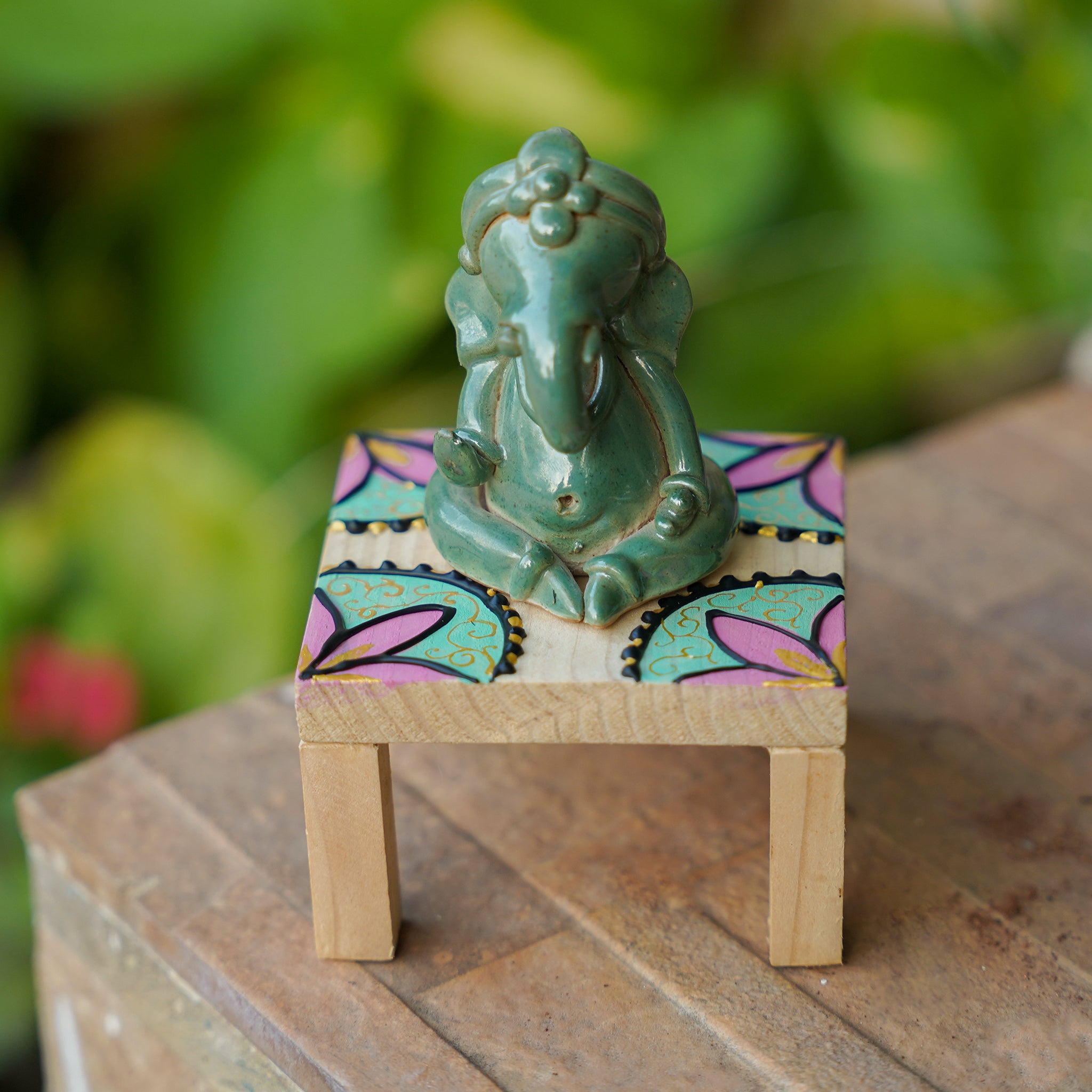 Traditional Handmade Ceramic Ganesh Murti on Wooden Platform