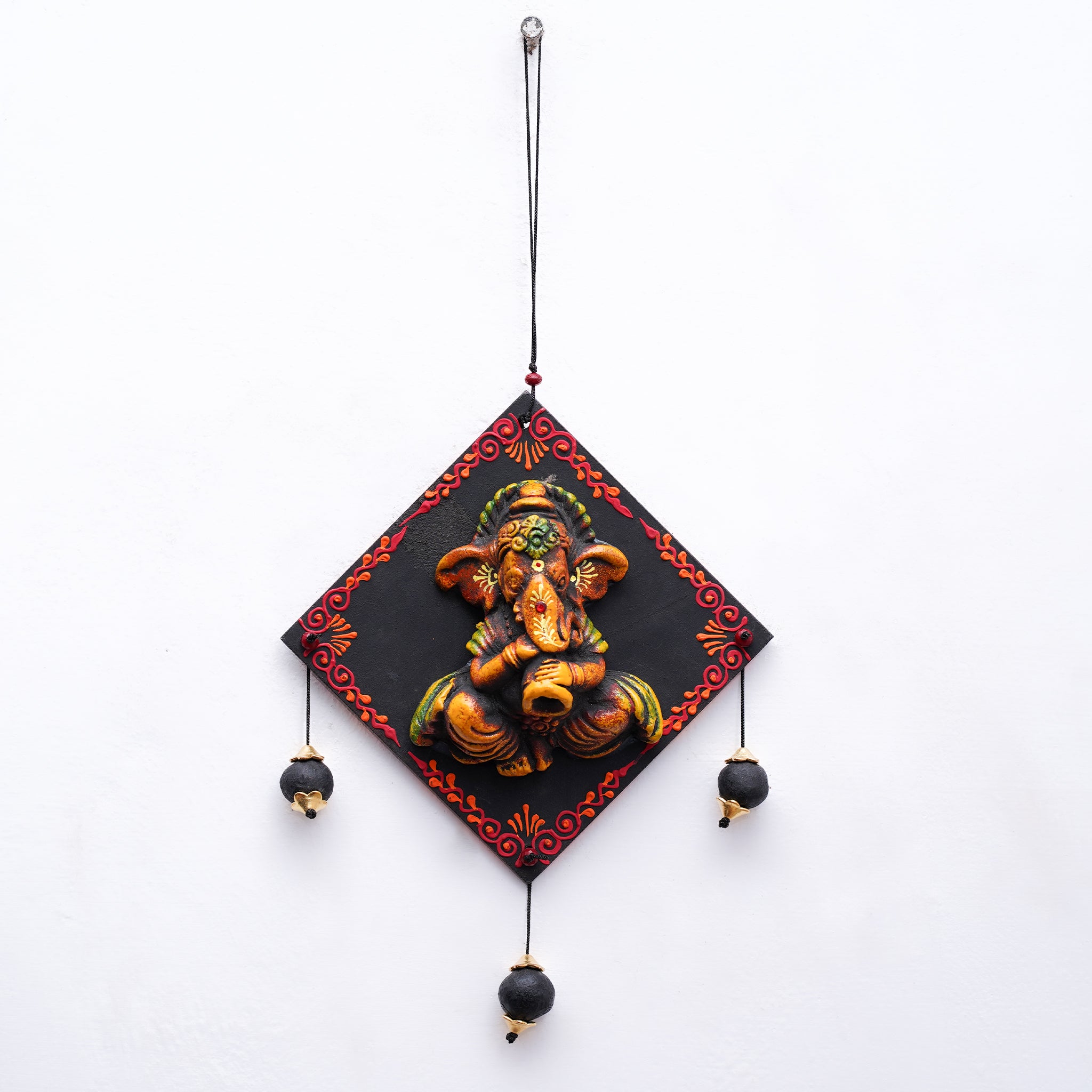 Ethnic Terracotta Ganesha Wall Hanging – Black & Orange Accents